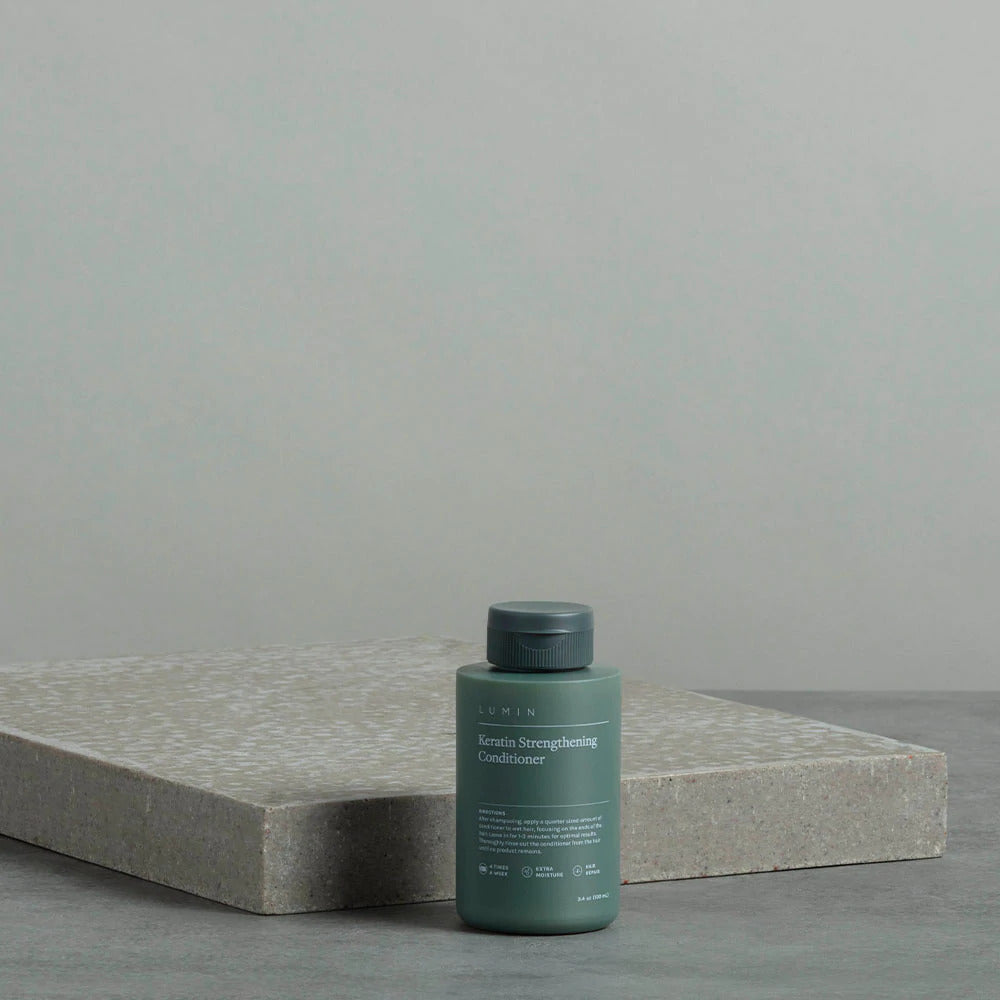 Lumin Advanced Keratin Fortifying Conditioner: Deep hydration for strong, healthy hair.