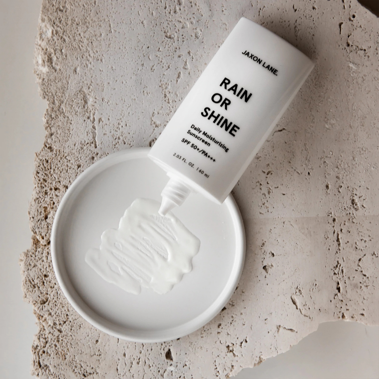 Jaxon Lane Rain Or Shine Daily Moisturizing Sunscreen: No white cast, oil-free, hassle free sunscreen.  2x award winning sunscreen that goes on smooth and dries clear, so you can feel safe and look great.
