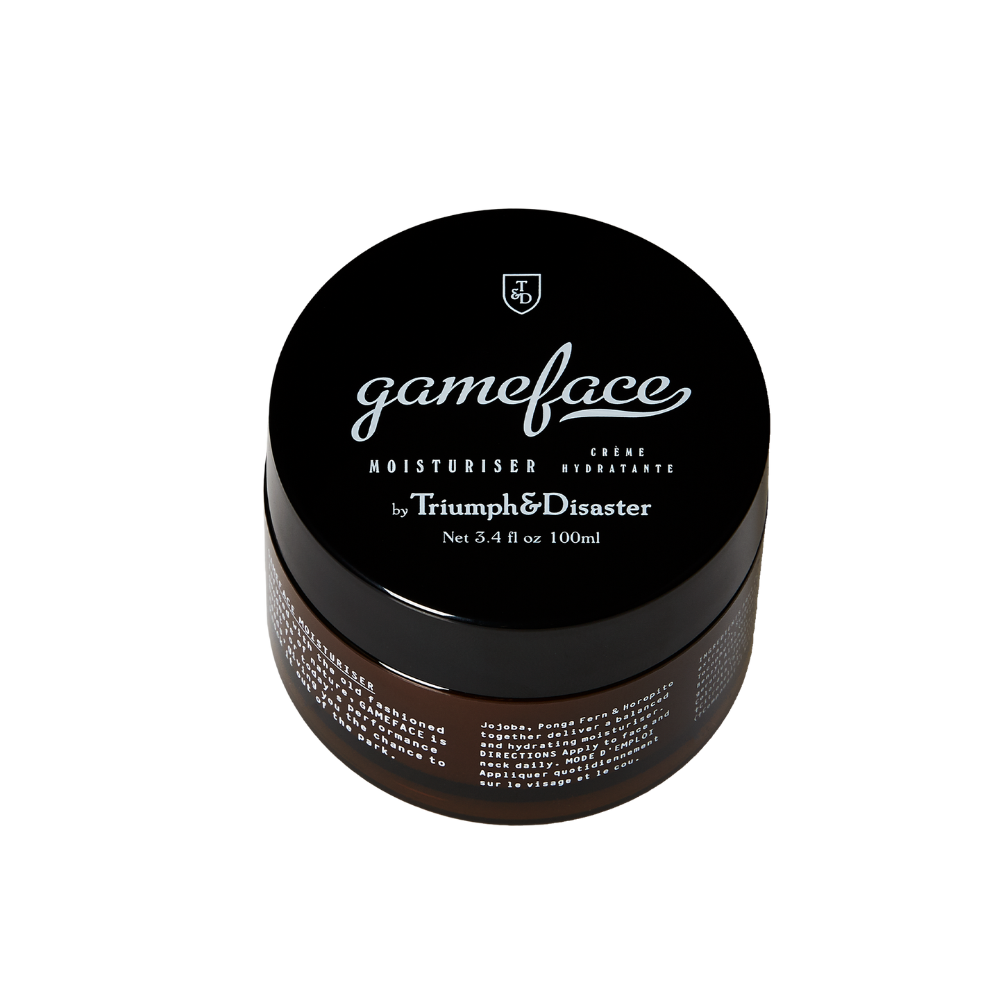Triumph and Disaster Gameface Moisturiser - Jar: Gameface moisturizer is a tool to serve and protect you against the elements. Specifically engineered to be light on the skin and easily absorbed, Gameface is a unique formulation of Jojoba extract, Horopito oil, Ponga fern (Cumingii) and Vitamin E, combined with a subtle infusion of essential oils to deliver a fragrance we call 'smoke and wood'. The result is a nutrient rich, hydrating cream that will leave skin feeling toned, supple and fresh.